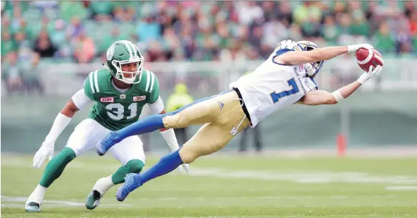  ?? MICHAEL BELL ?? Roughrider­s boss Chris Jones incurred the wrath of many by releasing popular slotback Weston Dressler, shown making a catch for the Winnipeg Blue Bombers last season.