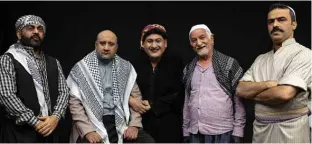  ??  ?? (From left to right) Iraqi actors Ayad Al-Atabi, Mohammad Qassem, Oussama Mahdi, Kamel Al-Azraqi, and Youssef AlHajjaj pose for a group picture on the set of a parody sketch video of Bab al-Hara, an adaptation of an iconic long-running Syrian television drama, in Iraq’s southern port city of Basra.—AFP photos