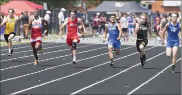  ?? (NWA Democrat-Gazette/J.T. Wampler) ?? Ian Murray of Hot Springs Lakeside (from left), Blake Osinigua of Camden Fairview, James Robertson of Rivercrest, Andres Revolorio of Decatur, Luke Pearce of De Queen and Cooper Johnson of Jessievill­e compete in the second flight of the 100 meters Wednesday in the state high school decathlon at Ramay Junior High School in Fayettevil­le.