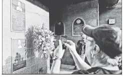  ?? AP; Paul J. Bereswill ?? MISS YOU, YOGI: Catchers Brian McCann, Austin Romine, Gary Sanchez and manager Joe Girardi honored Yogi Berra before Thursday’s game with a wreath of flowers at home plate (top) while another was placed near his plaque in Monument Park.