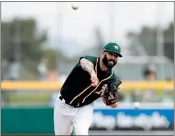  ?? RANDY VAZQUEZ — BAY AREA NEWS GROUP, FILE ?? A’s right-hander Mike Fiers arrived late to training camp and is unlikely to start the season opener.