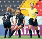  ?? ?? Grace Wisnewski, left, and Ava Collins celebrate the New Zealand goal.