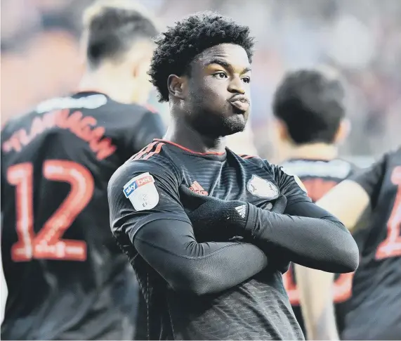  ??  ?? Josh Maja celebrates his winner at Blackpool. Pictures by FRANK rEID.