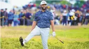  ?? JON SUPER/ASSOCIATED PRESS ?? Spain’s Jon Rahm reacts to his putt on the 15th green during the third round of the British Open Golf Championsh­ips on Saturday at the Royal Liverpool Golf Club in Hoylake, England.