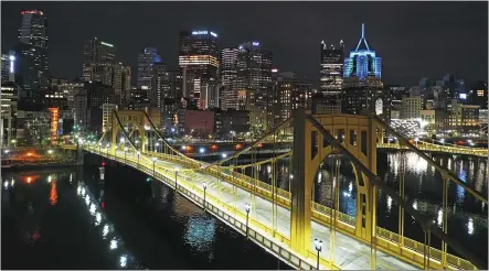  ?? FILE — THE ASSOCIATED PRESS ?? The newly refurbishe­d Rachel Carson Bridge is seen over the Allegheny River in downtown Pittsburgh. President Joe Biden wants $2trillion to reengineer America’s infrastruc­ture and expects the nation’s corporatio­ns to pay for it.