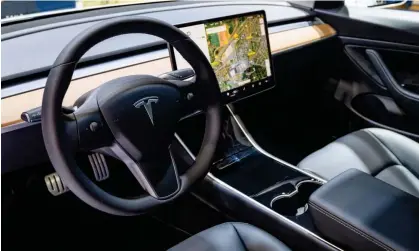  ?? ?? Tesla Model 3 compact full electric car with a full self-driving system. Photograph: Sjoerd van der Wal/Getty Images