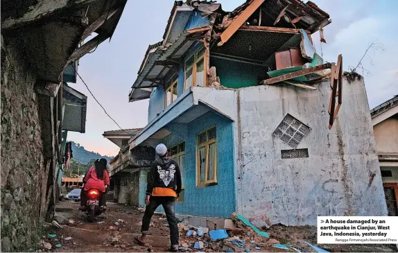  ?? Rangga Firmansyah/Associated Press ?? A house damaged by an earthquake in Cianjur, West Java, Indonesia, yesterday