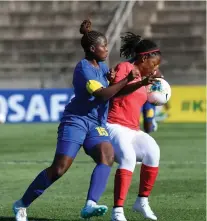  ?? –Photo: Contribute­d ?? Fighting on…Tura Magic Ladies (blue) will today fight for a place in the semi-finals of the ongoing Cosafa Women’s Champions League when they take on Zambian side Green Buffaloes.