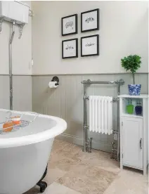  ??  ?? MAIN EN SUITE
Period style fittings ensure a historic look. Panelling in Stony Ground estate eggshell, £67 for 2.5ltr; walls in Clunch estate emulsion, £49.50 for 2.5ltr, both Farrow & Ball. Cambridge roll-top bath, £800, Bathstore