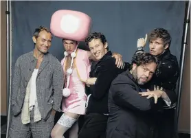  ?? PHOTO: TNS ?? The cast of Fantastic Beasts 2 (from left) Jude Law, Ezra Miller, Callum Turner, Dan Fogler and Eddie Redmayne pose during ComicCon 2018.