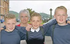 ??  ?? Grandmothe­r Marjorie Lang, 64, was with Castlehill pupils William McLean, Cameron McMillan and Calum McAllister, all aged 11.