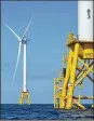  ?? ASSOCIATED PRESS ?? Three wind turbines from the Deepwater Wind project stand in the Atlantic Ocean off Block Island, R.I.