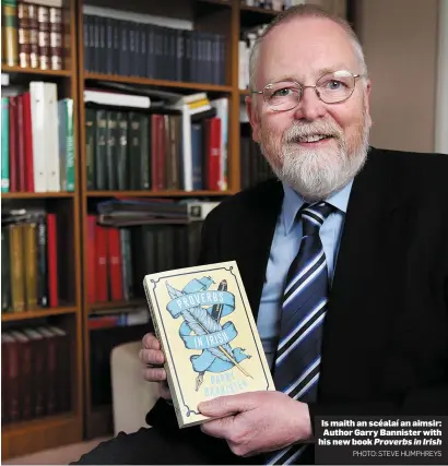  ?? PHOTO: STEVE HUMPHREYS ?? Is maith an scéalaí an aimsir: Author Garry Bannister with his new book Proverbs in Irish