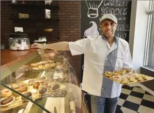  ?? JOHN RENNISON, THE HAMILTON SPECTATOR ?? Kamel Mahfoudia, 45, is the proprietor of French Confection, a new bakery downtown at Wilson Street and James Street North.