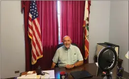  ?? Courtesy photo ?? During his recent visit to Washington, D.C., Newhall resident Daniel Bradley took advantage of a photo op, sitting at the desk of Rep. Mike Garcia, R-Santa Clarita.