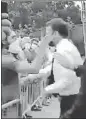  ?? SOURCED ?? A video still shows the moment when a man is seen slapping Emmanuel Macron.