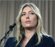  ?? DAMIAN DOVARGANES — THE ASSOCIATED PRESS FILE ?? In this Monday file photo, tennis star Maria Sharapova speaks about her failed drug test at the Australia Open during a news conference in Los Angeles. Maria Sharapova will find out the week starting if she can compete at the French Open, the French...
