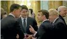  ?? AP ?? President Emmanuel Macron, centre right, gestures as he speaks during a NATO reception while speaking to, from left, Dutch Prime Minister Mark Rutte, Canadian PM Justin Trudeau and British PM Boris Johnson.
