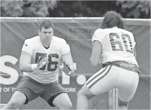  ??  ?? Colts offensive guard Quenton Nelson (56), taken sixth overall in the draft, works on technique during the first week of training camp. MICHAEL CONROY/AP