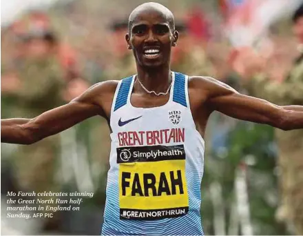  ?? AFP PIC ?? Mo Farah celebrates winning the Great North Run halfmarath­on in England on Sunday.