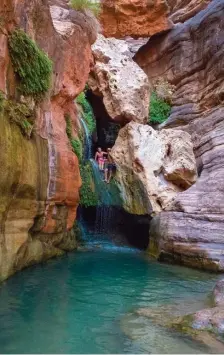  ??  ?? SWIMMING SPOT: An emerald pool, vivid rocks and green ferns made Elves Chasm a special spot.