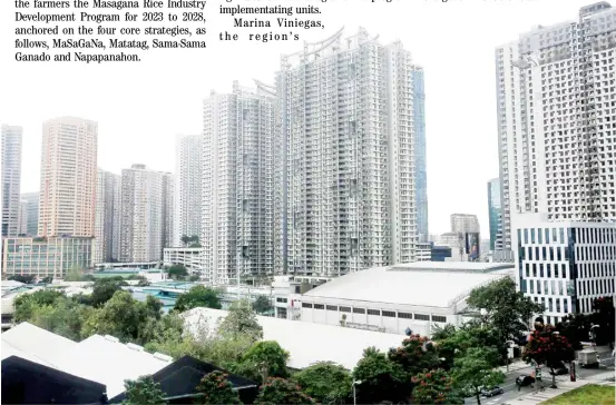  ?? PHOTOGRAPH BY ANALY LABOR FOR THE DAILY TRIBUNE @tribunephl_ana ?? HIGH-RISE buildings provide a backdrop to the metropolis as seen from Mandaluyon­g City. The government says that the country’s tax revenues have risen by five percent to hit P2.53 trillion.