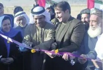  ?? EPA ?? Juma Al Kaabi, the UAE Ambassador to Afghanista­n, cuts the ribbon at a ceremony prior to being injured in the Kandahar blast.