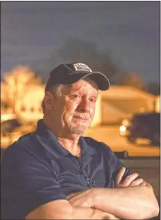  ??  ?? Jeff Carter becomes emotional as he remembers his daughter, Kayla, while sitting outside his home in Milton, W.Va.