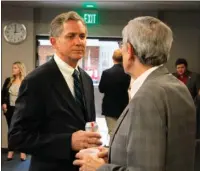  ?? The Associated Press ?? FRENCH HILL: U.S. Rep. French Hill talks to state Rep. Jack Ladyman on Aug. 27 at the Republican Party of Arkansas headquarte­rs in Little Rock. Hill, a Republican, is being challenged in Arkansas’ 2nd Congressio­nal District by Democrat Clarke Tucker, a state representa­tive.