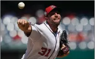  ?? AP/NICK WASS ?? Washington Nationals starting pitcher Max Scherzer struck out 11 batters while allowing 3 runs on 4 hits in 7 innings in the Nationals’ 4-3 victory over the St. Louis Cardinals on Monday at Nationals Park in Washington, D.C.