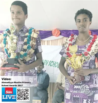  ?? Photo: Losirene Lacanivalu ?? Dux winner Krishneel Nair (left) with overall student of the year winner Adi Laisani Mafi .