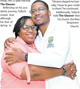  ?? ?? Joel Tulloch, one of 23 medical students who escaped the war in Ukraine, hugs his mother, Kelly-Ann Tulloch, after becoming one of the white coat medical graduates at the Caribbean School of Medical Sciences, Jamaica’s 6th Annual White Coat ceremony at the Caribbean Medical School at 77 Shortwood Road in St Andrew yesterday.