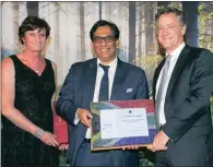  ??  ?? The Investec Managed Fund was awarded the special Raging Bull Award for risk-adjusted performanc­e by a South African multi-asset equity fund over 21 years. The award was presented to Chris Freund (right), a portfolio manager at Investec Asset...