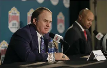  ?? PHOTO/ERIC GAY ?? TCU head coach Gary Patterson, left, and Stanford head coach David Shaw, right, take part in a news conference for the Alamo Bowl NCAA college football game Wednesday in San Antonio. The game is scheduled for today. AP