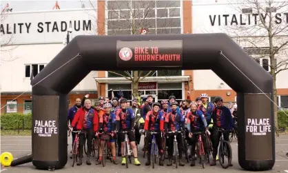  ??  ?? Crystal Palace fans arrive at the Vitality Stadium after cycling from Selhurst Park to raise money for the Palace for Life Foundation. Photograph: Palace for Life Foundation