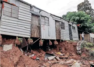  ?? PHILL MAGAKOE ?? HOMES damaged in a mudslide in Clermont, near Durban. |