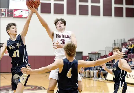  ?? Bud Sullins/Special to the Herald-Leader ?? Siloam Springs senior Murphy Perkins drives to the basket against Bentonvill­e West during a game earlier this season. Perkins and the Panthers host Greenbrier at 6 p.m. Friday for homecoming.