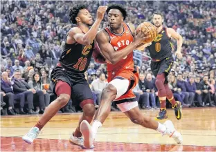  ?? JOHN E. SOKOLOWSKI • USA TODAY SPORTS ?? Toronto Raptors’ OG Anunoby drives to the net against Cleveland Cavaliers’ Darius Garland during NBA action on Monday night.