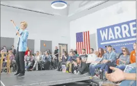  ?? Elizabeth Page Brumley Las Vegas Review-journal @Elipagepho­to ?? Sen. Elizabeth Warren speaks ahead of a town hall at the College of Southern Nevada’s Henderson campus on Monday. Her rally drew about 400 people to the student union.