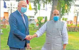  ??  ?? Defence minister Rajnath Singh with Australian minister Peter Dutton in New Delhi on Friday.