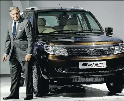  ?? — BLOOMBERG FILE PHOTO ?? Ratan Tata, chairman of Tata Motors Ltd., takes part in the launch of the Tata Safari Storm sport utility vehicle at the Auto Expo 2012 in New Delhi.