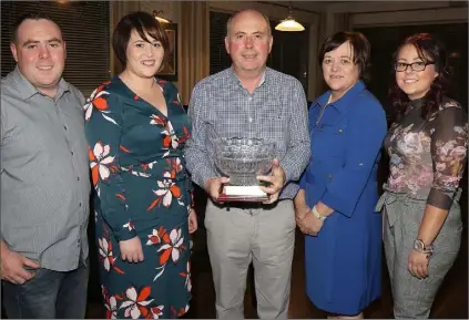  ??  ?? Billy Quirke with his wife Marie, daughters Fiona and Orla and son Niall at his retirement party at Enniscorth­y Golf Club.