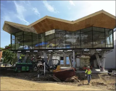  ?? (Arkansas Democrat-Gazette/Staton Breidentha­l) ?? Work continues Thursday in Little Rock on the Arkansas Museum of Fine Arts, formerly the Arkansas Arts Center, with the facility’s opening scheduled for May 2022.