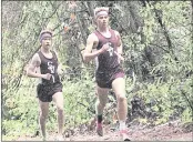  ?? ?? Scotts Valley High’s Austin George, left, and Jeremy Kain set the pace in the boys’ cross country race at SLV High on Thursday.