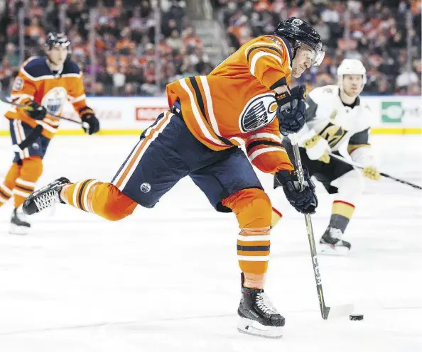  ?? CODIE MCLACHLAN/GETTY IMAGES ?? Defenceman Keegan Lowe made his NHL debut with the Edmonton Oilers against Vegas on Thursday and impressed the coaches with his hustle and willingnes­s to mix it up, much like his father Kevin Lowe, who starred with the Oilers for more than a dozen...