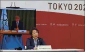  ?? YOSHIKAZU TSUNO – POOL PHOTO VIA AP ?? IOC President Thomas Bach, on a screen, speaks as Tokyo Organizing Committee President Seiko Hashimoto listens.