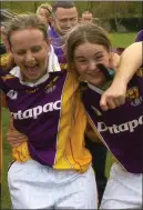  ??  ?? Lizzy Kent (left) celebratin­g a win with Deirdre Fox during her time as aWexford ladies’ football team member in 2007.