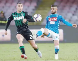  ?? — Reuters ?? Napoli’s Lorenzo Insigne in action with Sassuolo’s Pol Lirola.