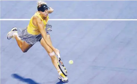  ??  ?? NEW HAVEN: Caroline Wozniacki of Denmark returns a forehand to Caroline Garcia of France on Day 4 of the Connecticu­t Open at Connecticu­t Tennis Center at Yale on Thursday in New Haven, Connecticu­t. — AFP