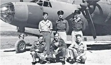  ??  ?? Gibbs, below and (right) back row, centre with his crew in front of their Marauder bomber in September 1944